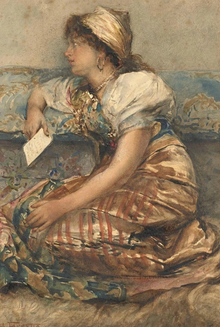 Giovane donna seduta che legge una lettera
